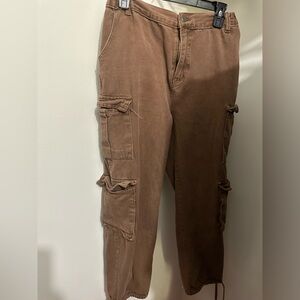 Brown Baggy Cargo Pants size XL (used) two belt loops broken
Discolored, washed